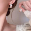 WHITE FLORAL DELICATE HOOPS - Image 5